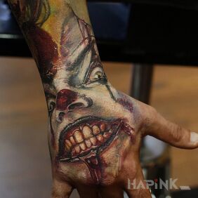 Tattoo Clown on the hand motif: characters