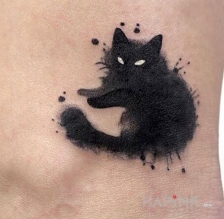 Tattoo Kotek in animals motif and blackwork / blackout style near the ankle