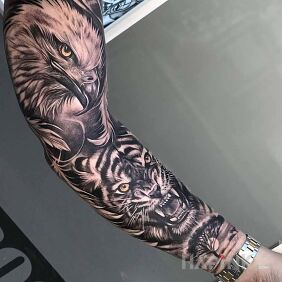 Tattoo The eagle and the tiger on the upper arm motif: 3D style: realistic