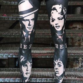 Tatuaż Czarne nogawy na kolanie motyw: twarze styl: blackwork / blackout