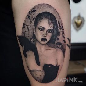 Tattoo Catwoman on the upper arm motif: animals style: realistic