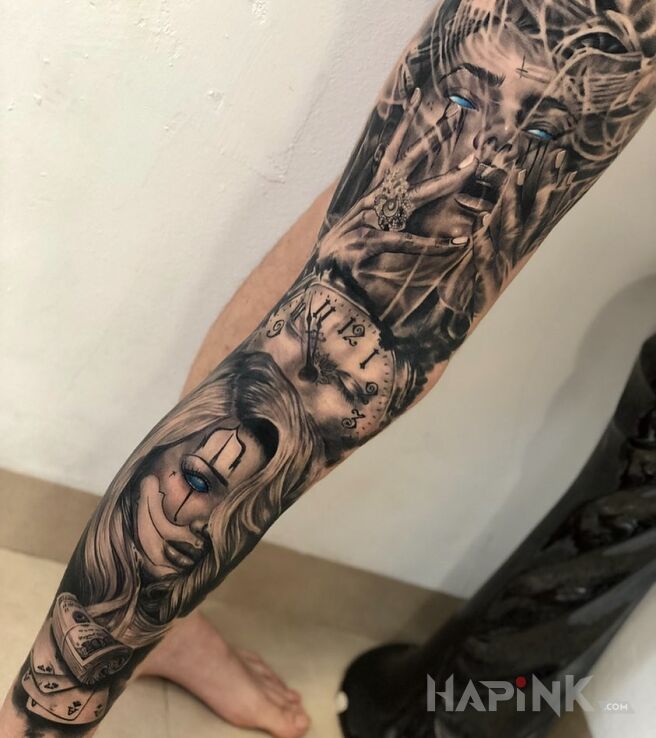 Tattoo Petarda in black and gray motif and realistic style on the leg