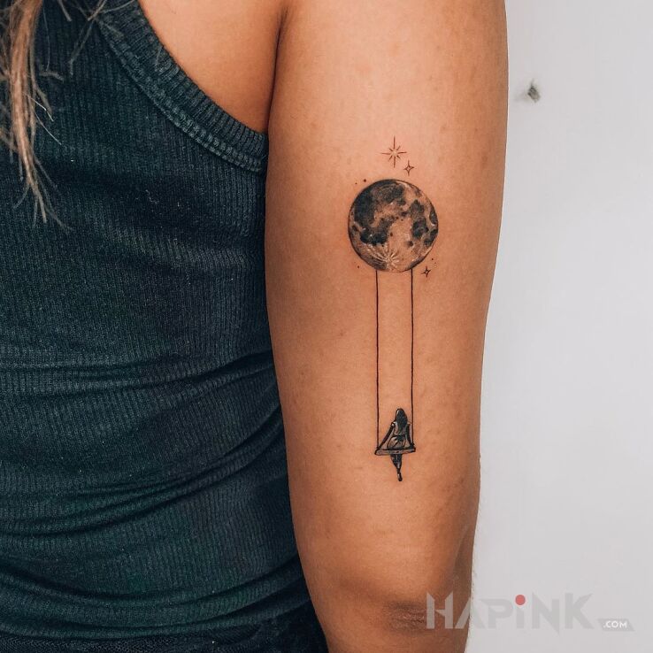 Tattoo Na hustawce :) in cosmos motif and graphic / illustrative style on the upper arm