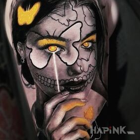 Tattoo A portrait in a different way on the upper arm motif: butterflies style: realistic
