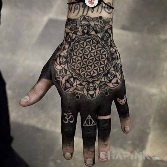Tattoo Niespotykana ręka in black and gray motif and dotwork style on the fingers
