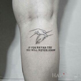Tattoo You never know on the forearm motif: lettering style: calligraphy