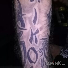 Tattoo Caption on the forearm motif: lettering