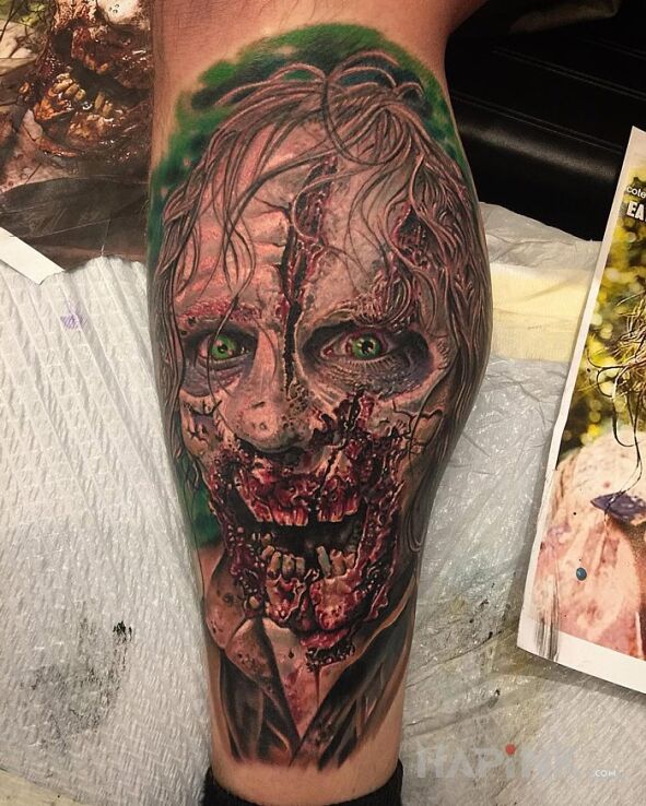 Tattoo Zombie in characters motif and realistic style on the leg
