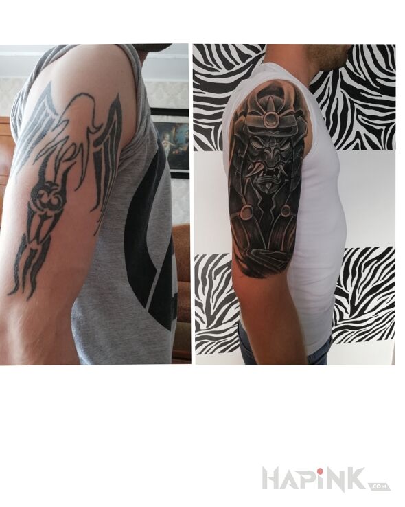 Tattoo Cover in demons motif and graphic / illustrative style on the upper arm