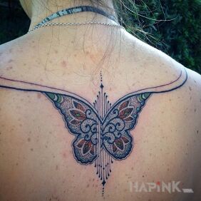 Tattoo Butterfly on the back motif: animals