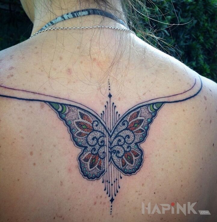 Tattoo Motyl in animals motif on the back