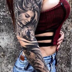 Tattoo Woman with portraits on the hand motif: black and gray style: realistic