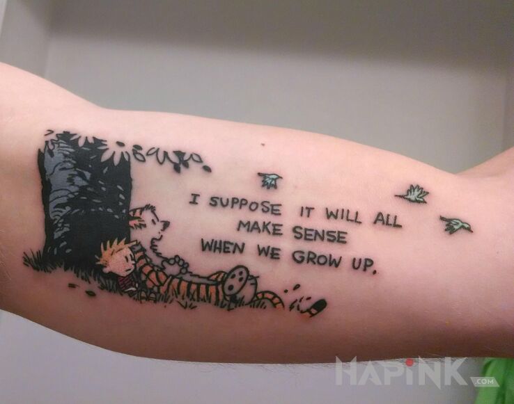 Tattoo Gdzie jest sens? in lettering motif and graphic / illustrative style on the upper arm