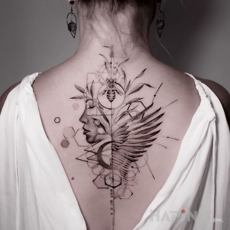 Tattoo Ciekawy projekt in black and gray motif and graphic / illustrative style on the back