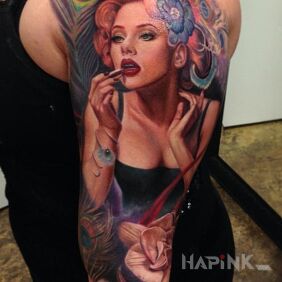 Tattoo Portrait on the upper arm motif: characters style: realistic