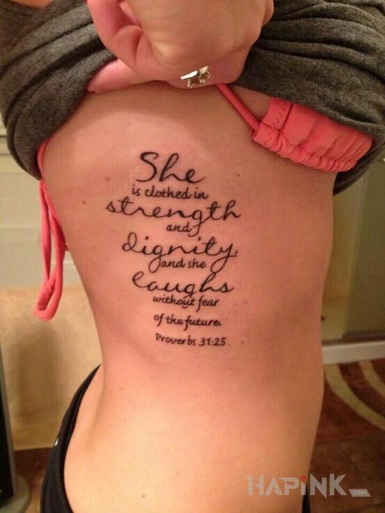 Tattoo Odziana w sile in lettering motif on the ribs