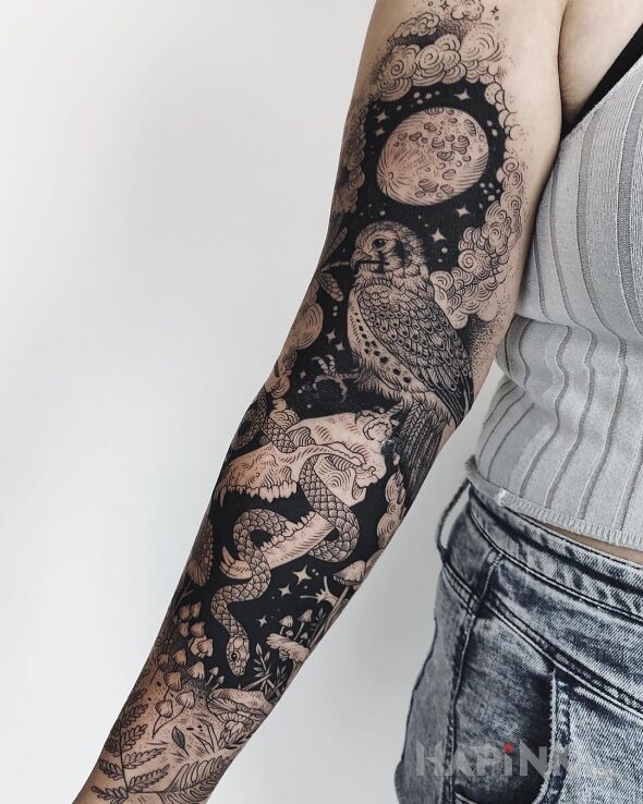 Tattoo Sówka in black and gray motif and graphic / illustrative style on the forearm