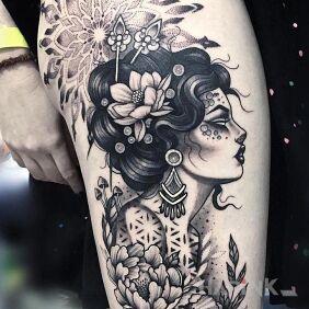 Tattoo Female portrait among flowers on the leg motif: flowers style: dotwork