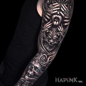 Tattoo Face hidden behind fingers on the upper arm motif: black and gray