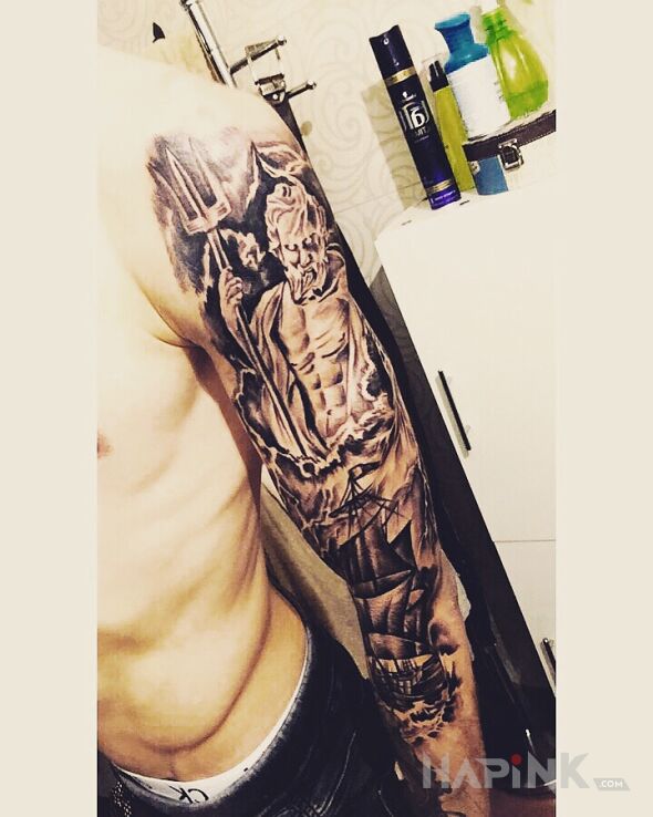 Tattoo Posejdon in sleeves motif and graphic / illustrative style on the forearm
