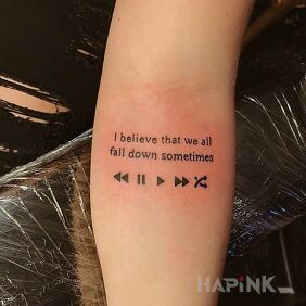 Tattoo Falls on the forearm motif: lettering style: calligraphy