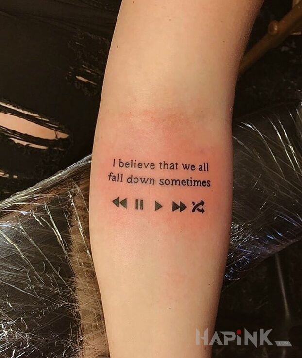 Tattoo Upadki in lettering motif and calligraphy style on the forearm