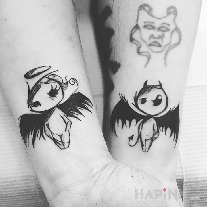 Tattoo Aniołek i demonek in angels motif and graphic / illustrative style on the wrist