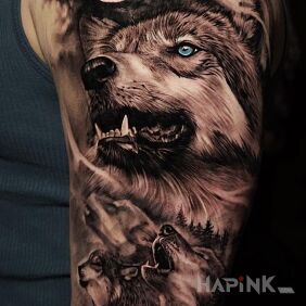 Tattoo A pack of wolves on the upper arm motif: animals style: realistic