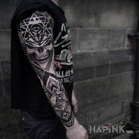 Tattoo Skull in geometric framework on the forearm motif: skulls style: geometric