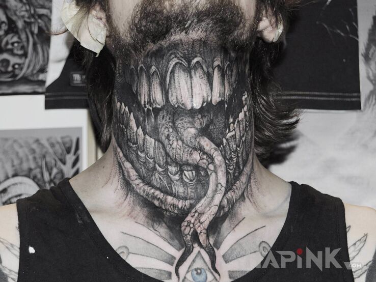 Tattoo Paszcza! in demons motif and graphic / illustrative style on the neck