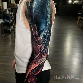 Tattoo Alien aliens on the forearm motif: dark style: realistic
