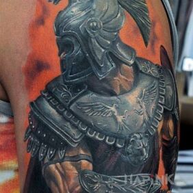 Tattoo Warrior on the upper arm motif: characters style: realistic