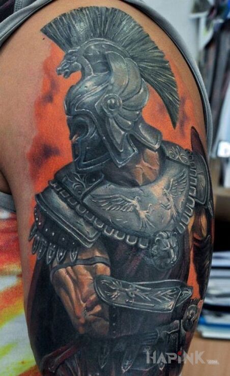 Tattoo Wojownik in characters motif and realistic style on the upper arm