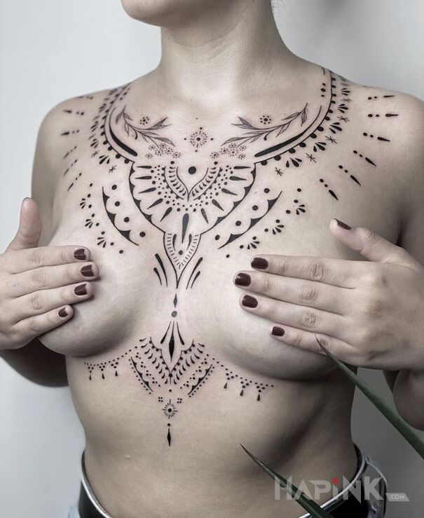 Tattoo Wzorki na klatce in ornaments motif and minimalistic style on the chest