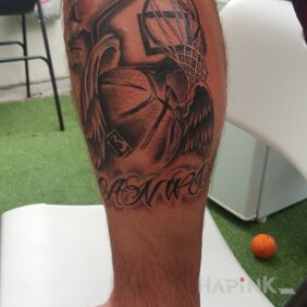 Tattoo Anwil wloclawek on the calf motif: wings style: graphic / illustrative