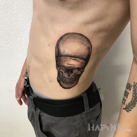 Tattoo Skull on ribs on the ribs motif: skulls style: graphic / illustrative