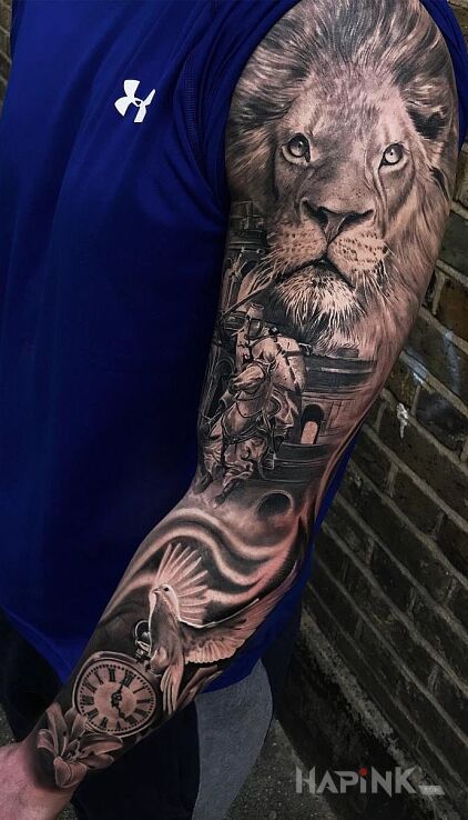 Tattoo Lion in animals motif and realistic style on the forearm