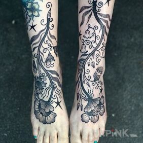 Tattoo Tattooed feet on the foot motif: flowers style: graphic / illustrative