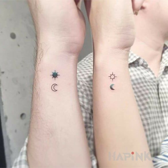 Tattoo Słońce i księżyc in Love motif and graphic / illustrative style on the wrist
