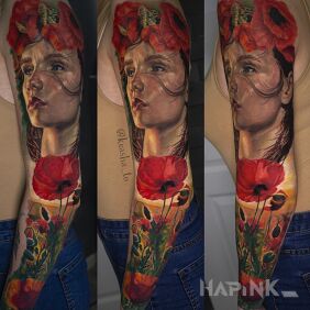 Tattoo Girl in poppies on the forearm motif: faces style: realistic
