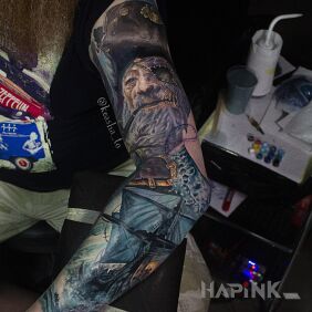 Tattoo Pirate on the upper arm motif: faces style: realistic