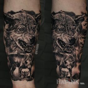 Tattoo Wolves on the forearm motif: black and gray style: realistic