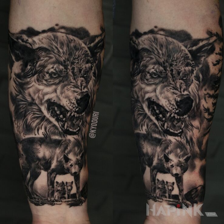 Tattoo Wilki in black and gray motif and realistic style on the forearm