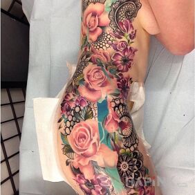 Tattoo Multitude of flowers on the leg motif: flowers