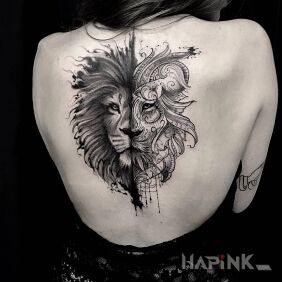 Tattoo Two faces of the lion on the back motif: animals style: graphic / illustrative