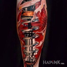 Tattoo Shock absorbers on the calf motif: motorization style: realistic