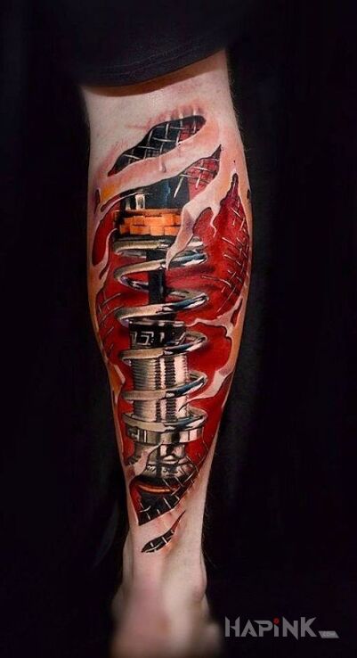 Tattoo Amortyzatory in motorization motif and biomechanics style on the leg