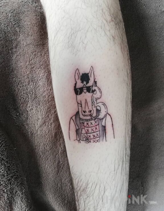 Tattoo Bojack horseman in black and gray motif and cartoon / comic book style on the calf