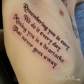 Tattoo Memory and longing on the ribs motif: lettering style: calligraphy