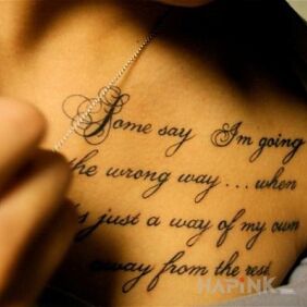 Tattoo Caption in English on the chest motif: lettering